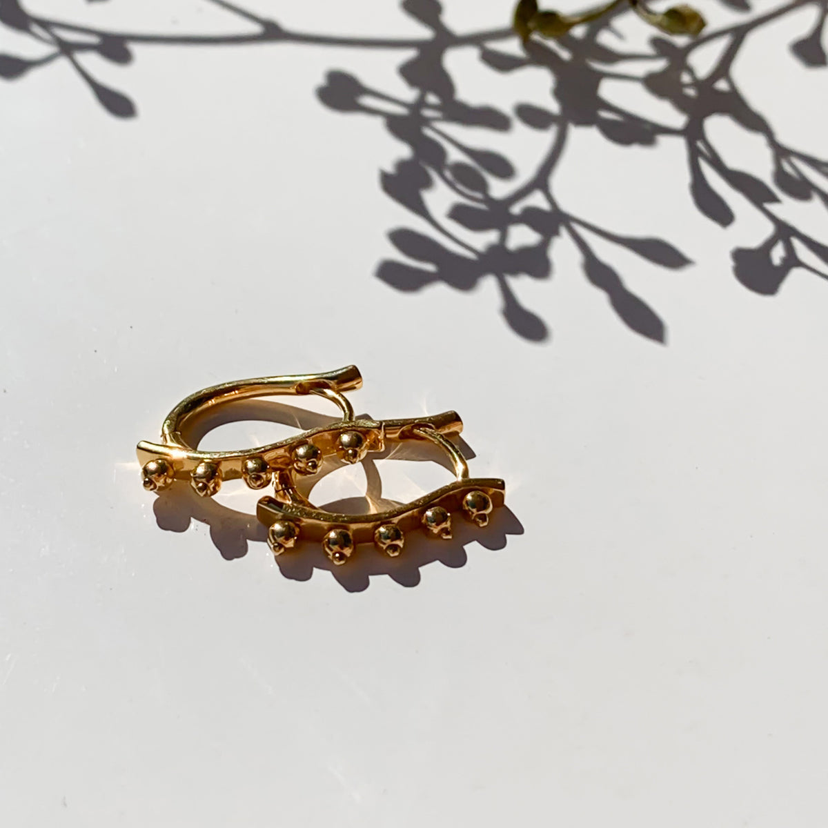 gold vermeil huggies earrings